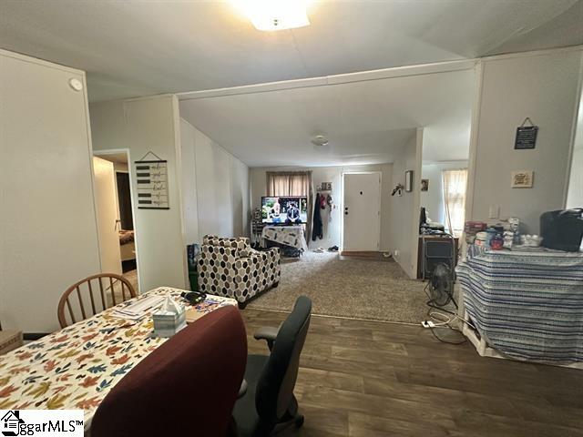 dining room featuring dark hardwood / wood-style flooring