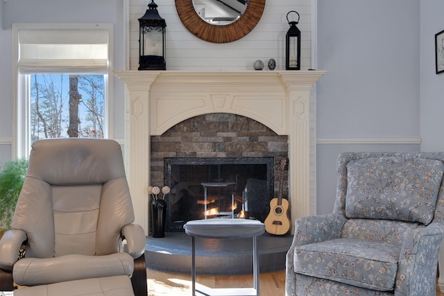 sitting room featuring hardwood / wood-style flooring