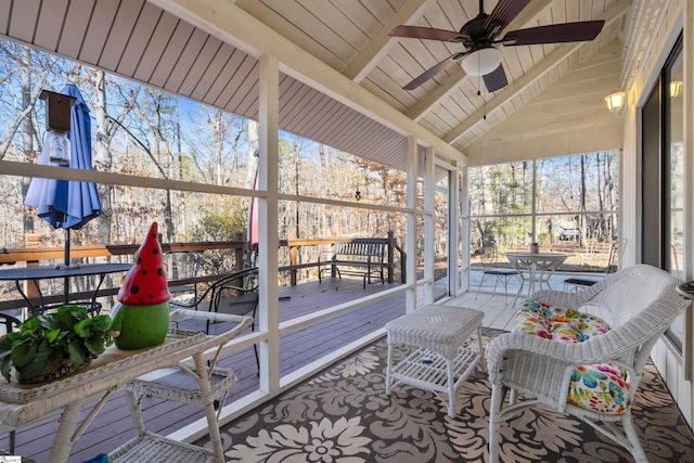 exterior space featuring ceiling fan