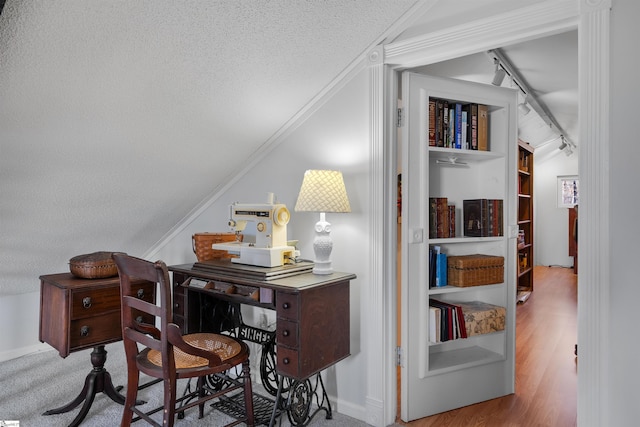 office featuring hardwood / wood-style floors, crown molding, track lighting, and a textured ceiling