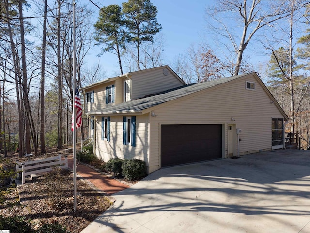 view of property exterior featuring a garage