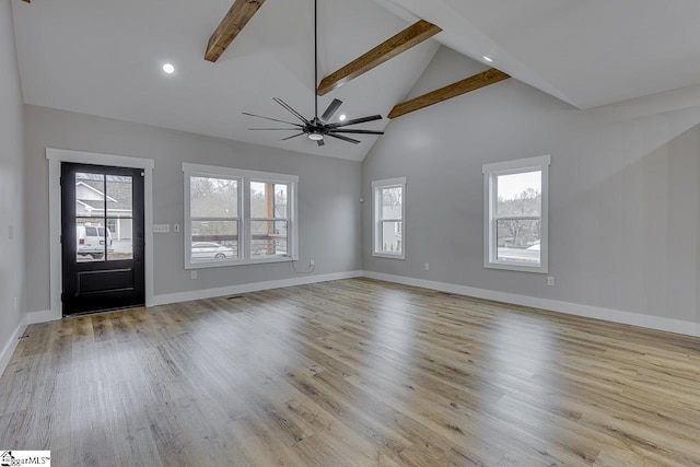 foyer with ceiling fan, high vaulted ceiling, beam ceiling, and light hardwood / wood-style flooring