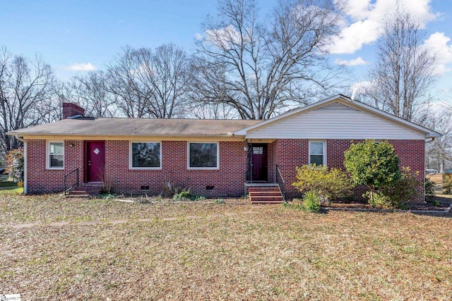 ranch-style home featuring a front yard