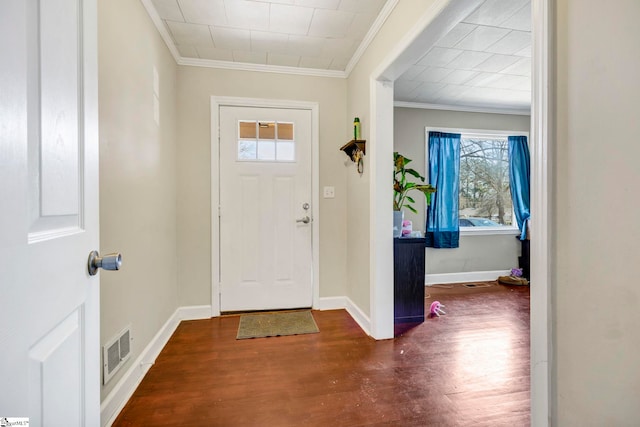 entryway featuring dark wood-type flooring and ornamental molding