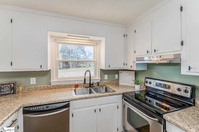 kitchen featuring stainless steel appliances, white cabinetry, and sink