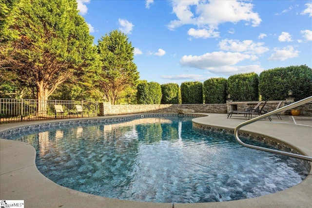 view of pool featuring a patio