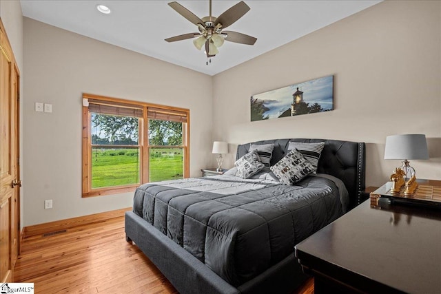 bedroom featuring ceiling fan and light wood-type flooring