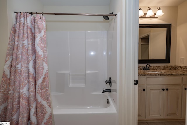 bathroom with vanity and shower / bath combination with curtain