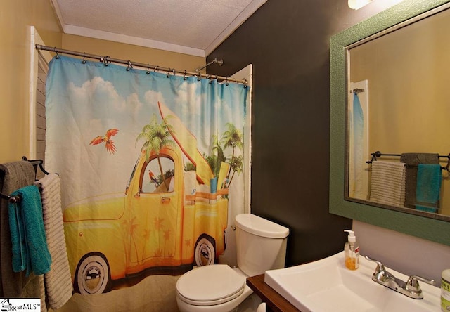 bathroom with a shower with curtain, toilet, sink, and a textured ceiling