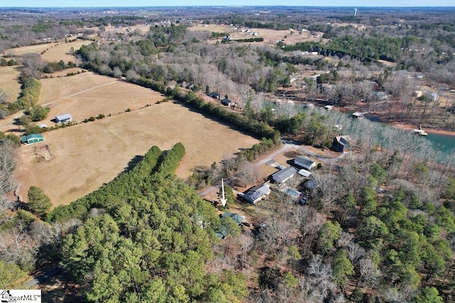 birds eye view of property with a rural view