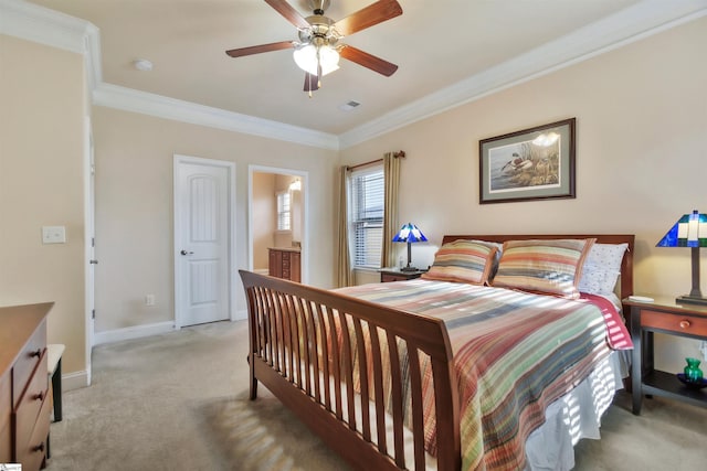 bedroom with connected bathroom, crown molding, light colored carpet, and ceiling fan