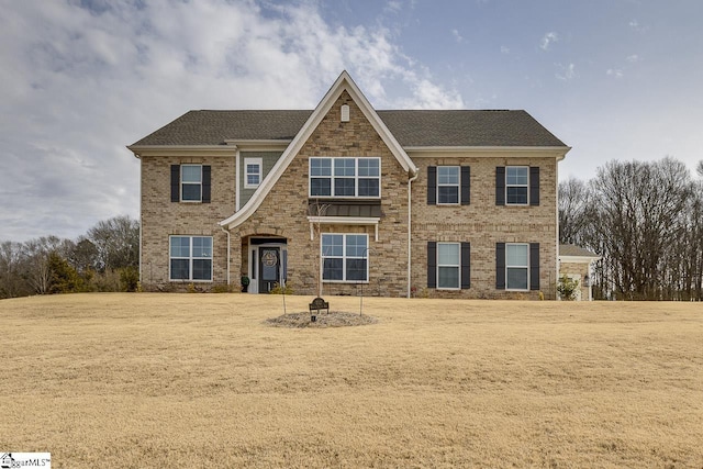 view of front of house with a front yard