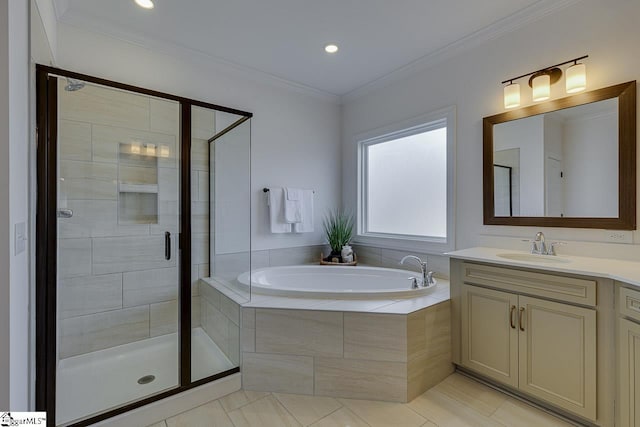 bathroom featuring ornamental molding, separate shower and tub, and vanity