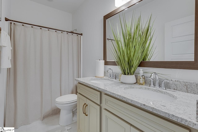 bathroom featuring a shower with curtain, vanity, tile patterned floors, and toilet