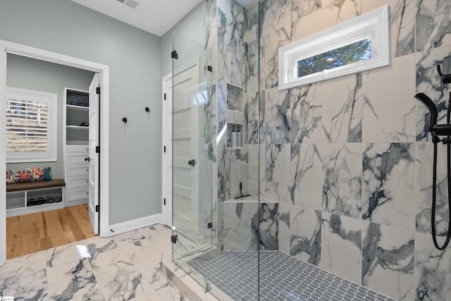 bathroom with walk in shower