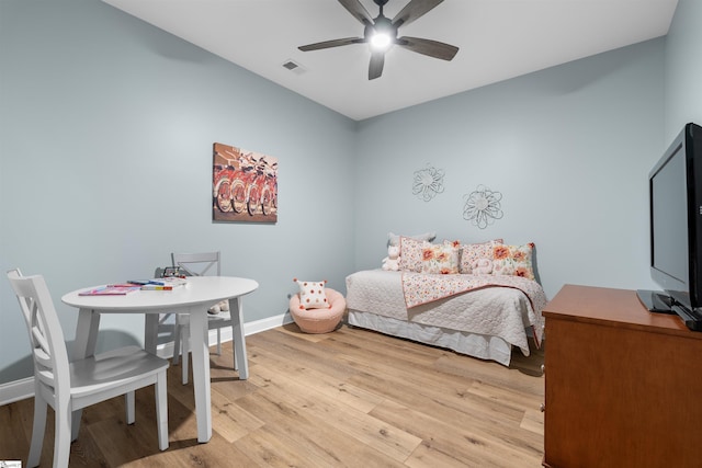 bedroom featuring ceiling fan and light wood-type flooring