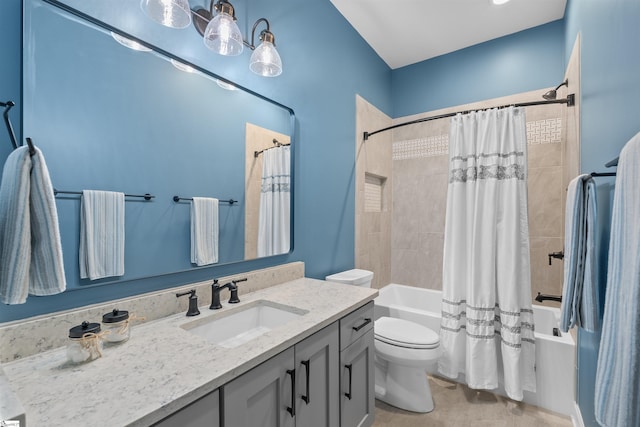 full bathroom with shower / bath combination with curtain, vanity, and toilet