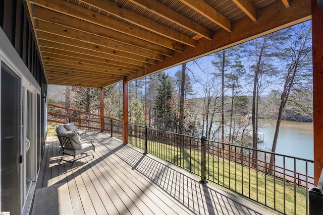 deck featuring a water view