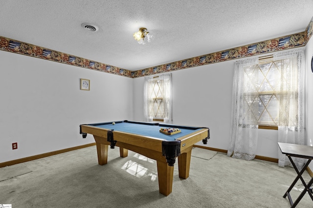 playroom with pool table, carpet floors, and a textured ceiling