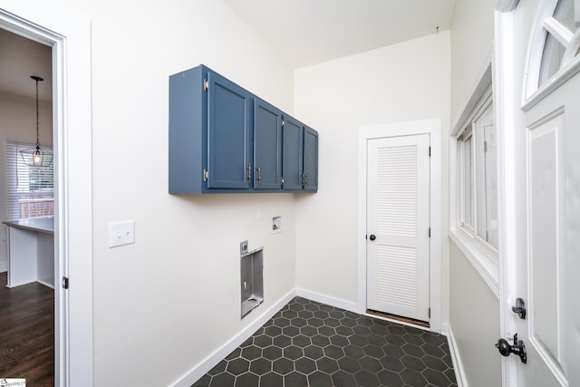 washroom with washer hookup, cabinets, and electric dryer hookup