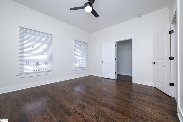 unfurnished bedroom featuring dark hardwood / wood-style flooring, crown molding, and ceiling fan