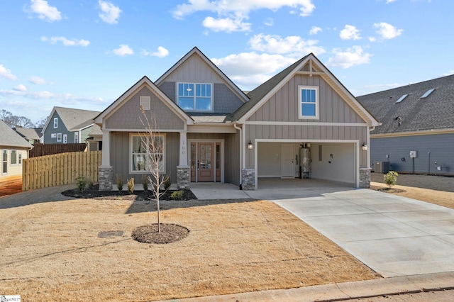 craftsman house featuring a garage and central AC