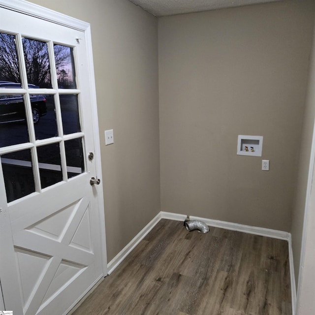 washroom featuring washer hookup and hardwood / wood-style flooring