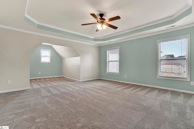 bonus room featuring light colored carpet and ceiling fan