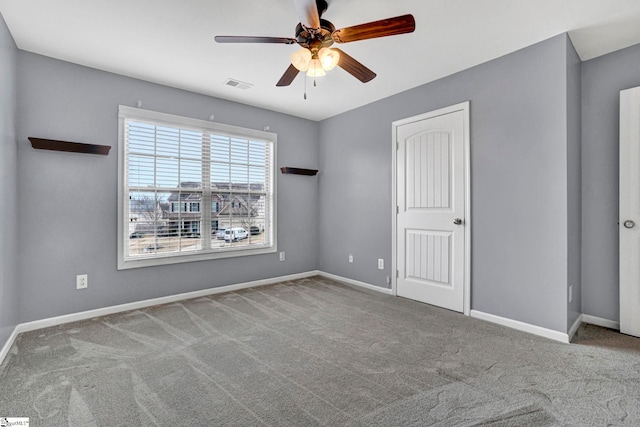 unfurnished bedroom with light carpet and ceiling fan