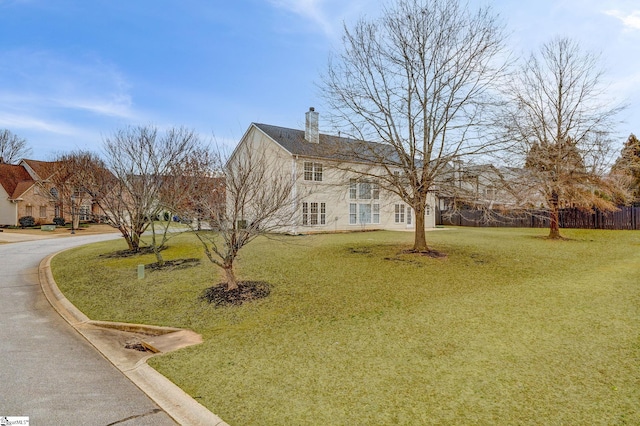 exterior space featuring a front lawn