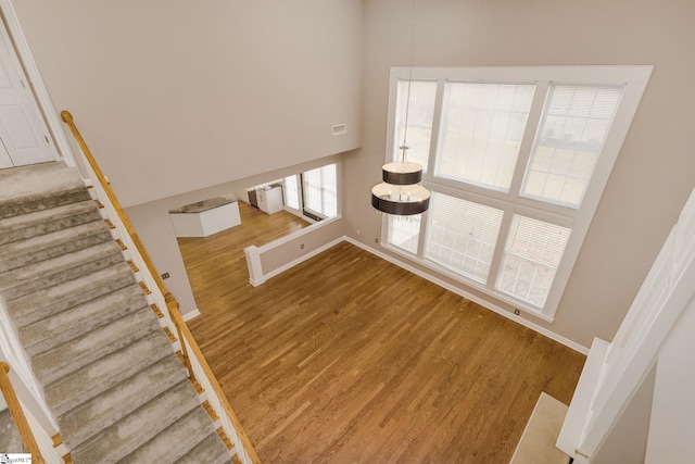 unfurnished living room with hardwood / wood-style floors