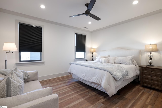 bedroom with wood-type flooring and ceiling fan