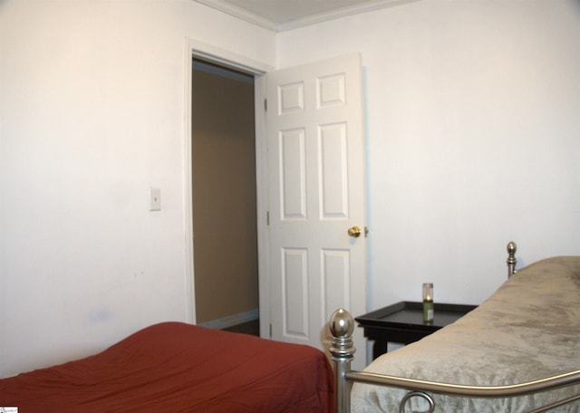 bedroom featuring ornamental molding