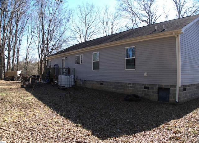 back of property with central air condition unit