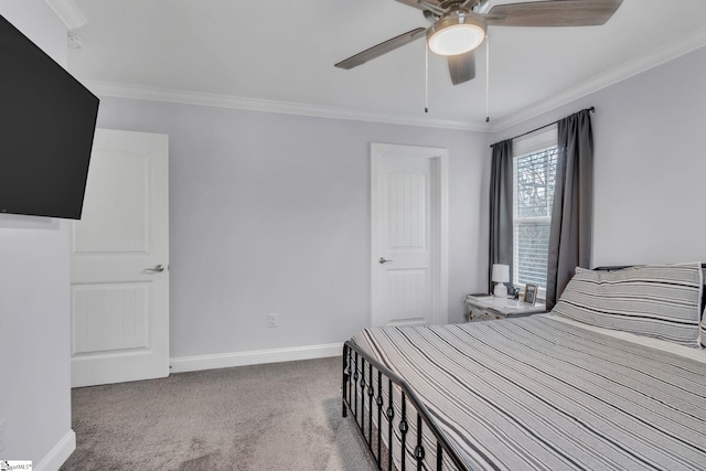 bedroom featuring ceiling fan, ornamental molding, and light carpet