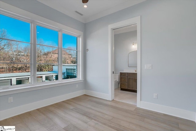 unfurnished room featuring light wood-type flooring