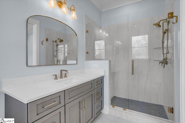 bathroom featuring vanity and a shower with shower door