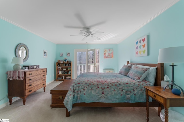 carpeted bedroom featuring access to exterior, ornamental molding, and ceiling fan