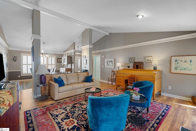 living room with lofted ceiling with beams, crown molding, decorative columns, and light hardwood / wood-style flooring