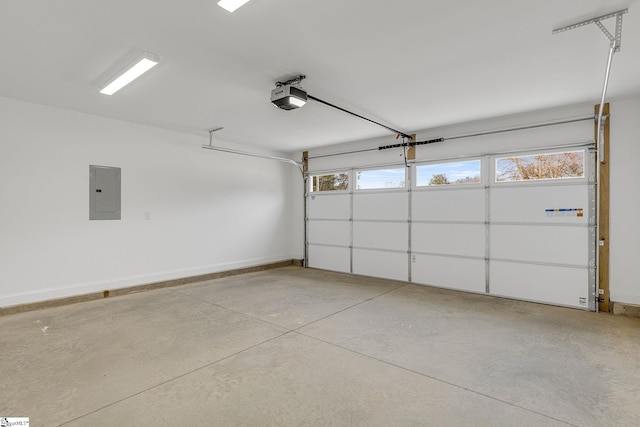 garage featuring a garage door opener and electric panel