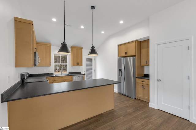 kitchen with sink, appliances with stainless steel finishes, hanging light fixtures, dark hardwood / wood-style flooring, and kitchen peninsula