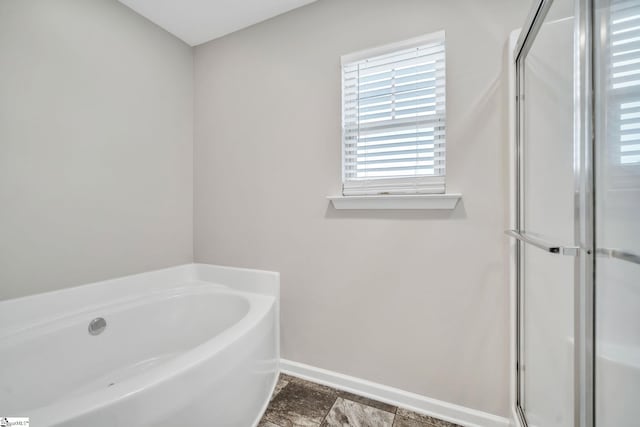 bathroom featuring a tub