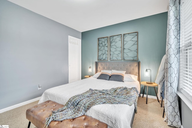 bedroom with light colored carpet