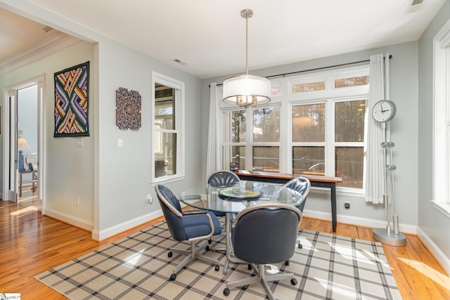 dining space featuring light hardwood / wood-style floors