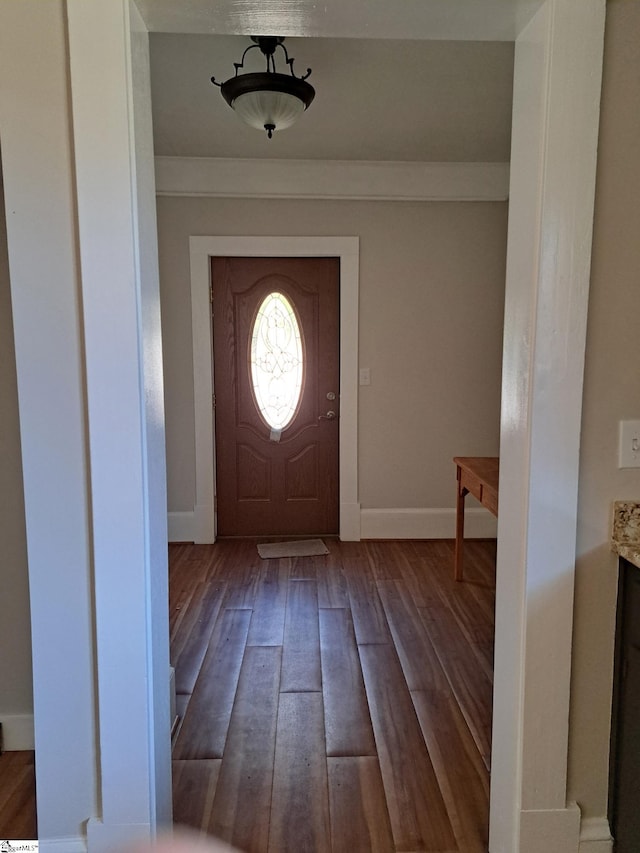 entryway with dark hardwood / wood-style floors