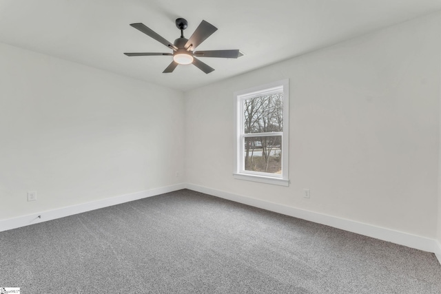 carpeted empty room with ceiling fan