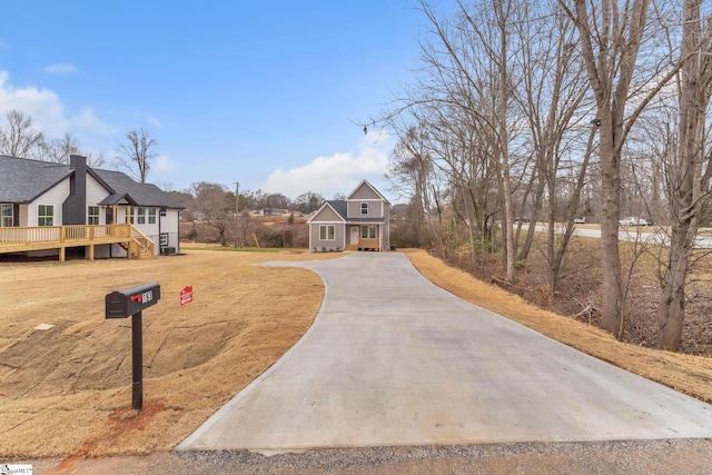 view of front of house with a wooden deck