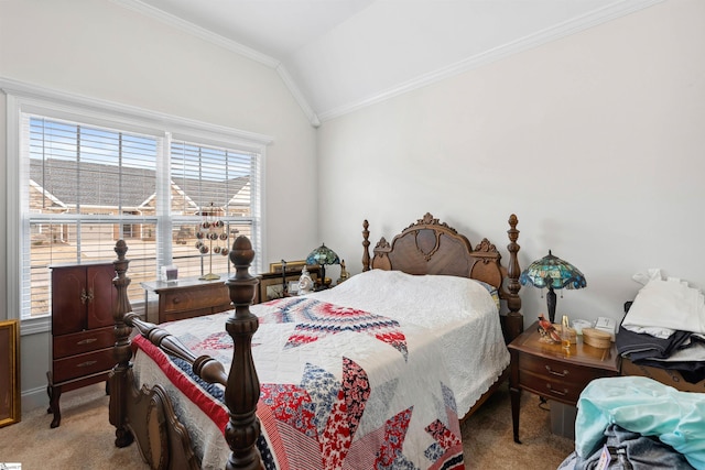 carpeted bedroom featuring crown molding and lofted ceiling