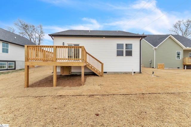 rear view of house with a deck