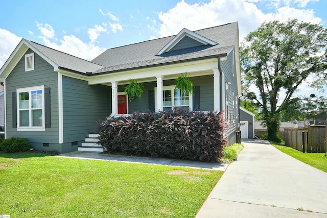 bungalow-style home with a porch and a front lawn